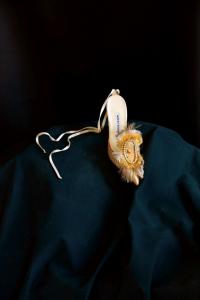 No. 206 One pretty Manolo shoe on black cloth