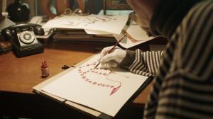 No. 64 Manolo working in his study at home